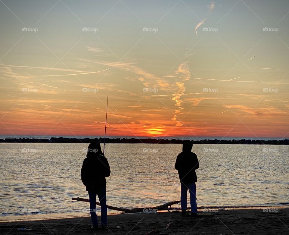 Fishing at Sunset on the Lake