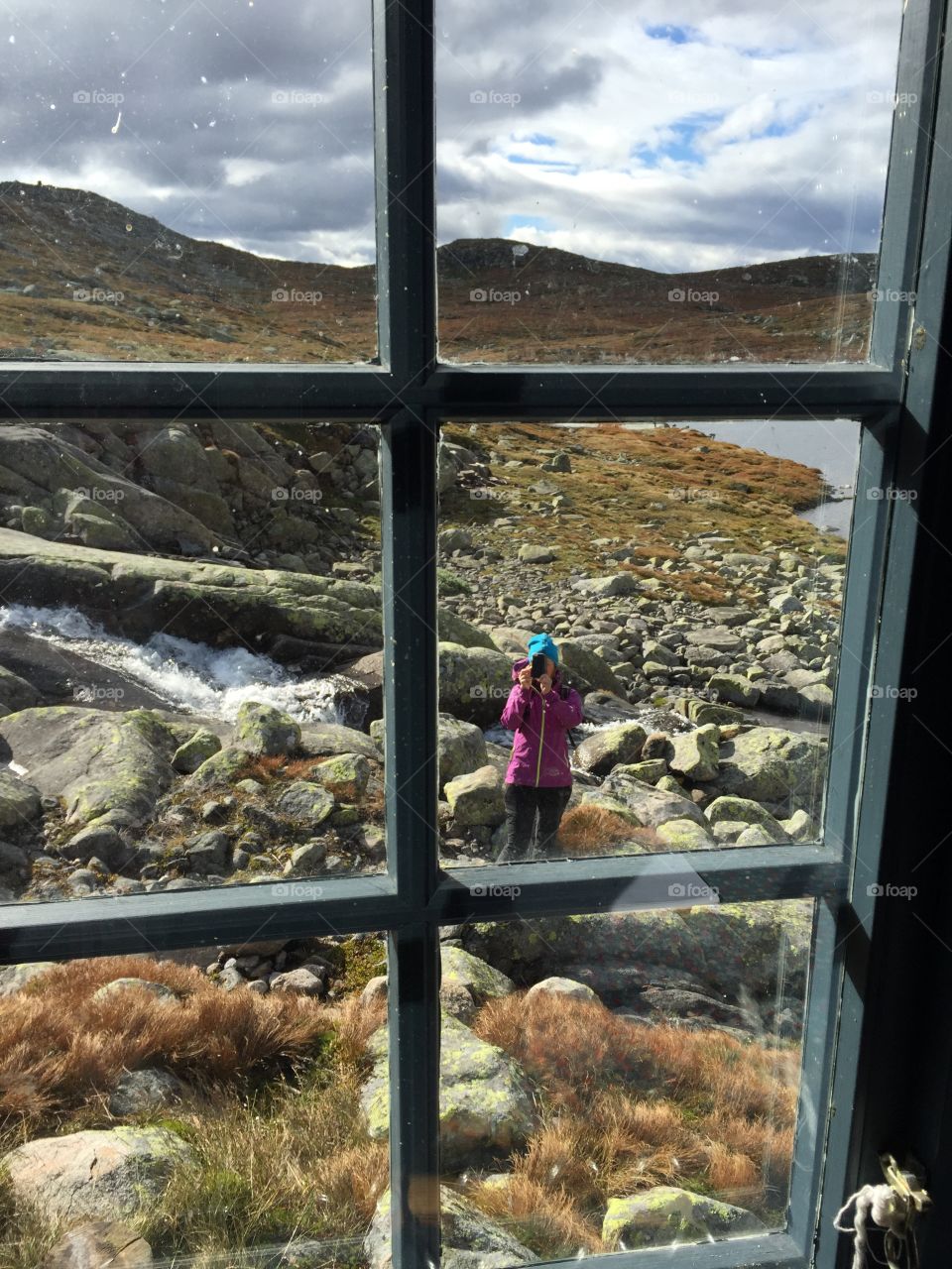 Cabin in Flå, Norway. Cabin window - shelter for hikers in the mountains