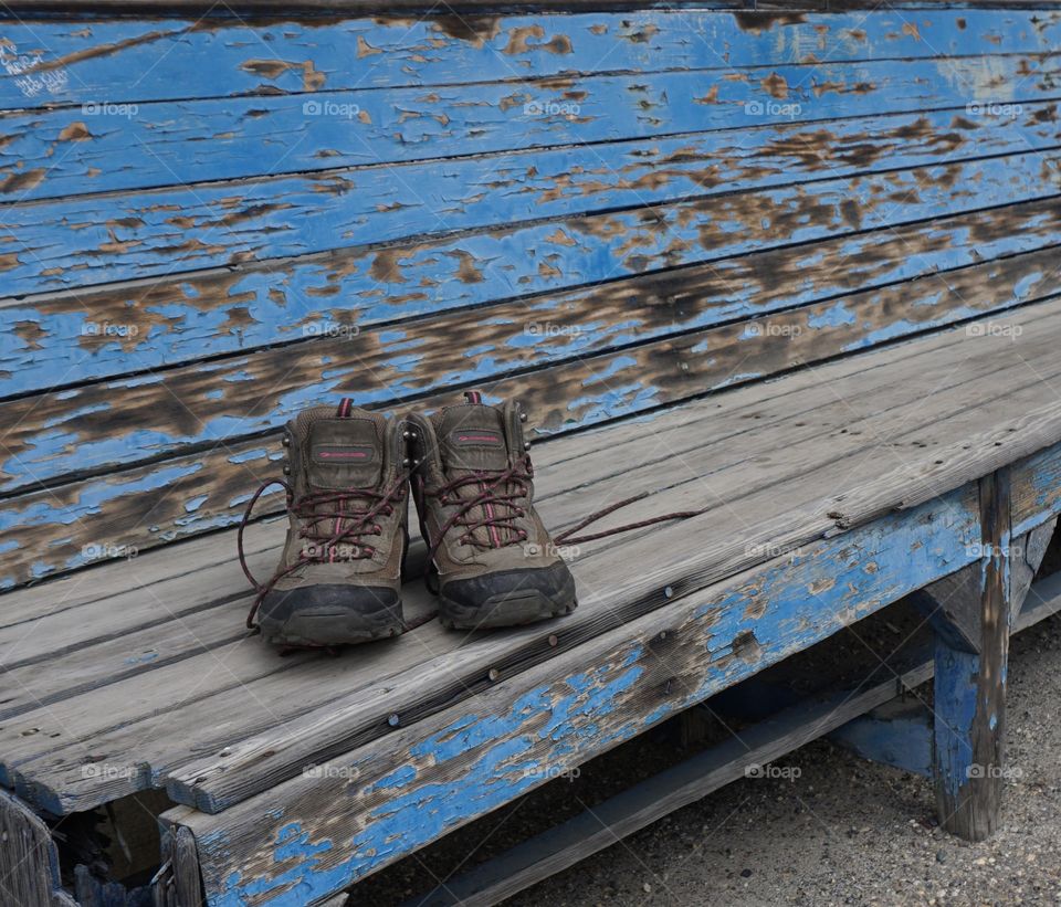 My walking boots on top of a tatty bench ....