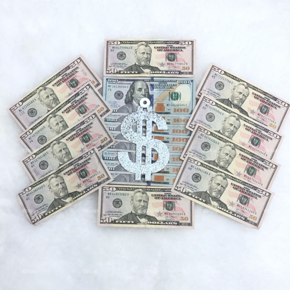 Paper money in different angles - Money is any item or verifiable record that is generally accepted as payment for goods and services and repayment of debts, such as taxes, in a particular country or socio-economic context