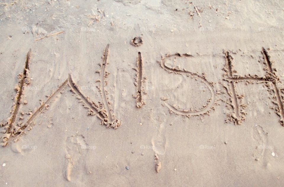 The lakeshore is a great place to dream. I don’t know how long it was before the words and footprints were washed away, but I do know the thought behind it is lasting.