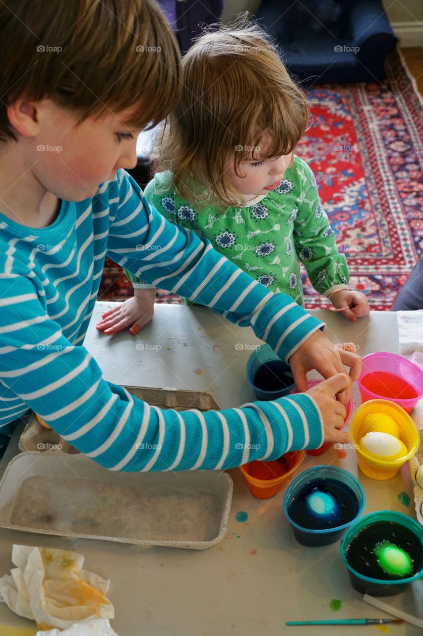 Kids Coloring Easter Eggs