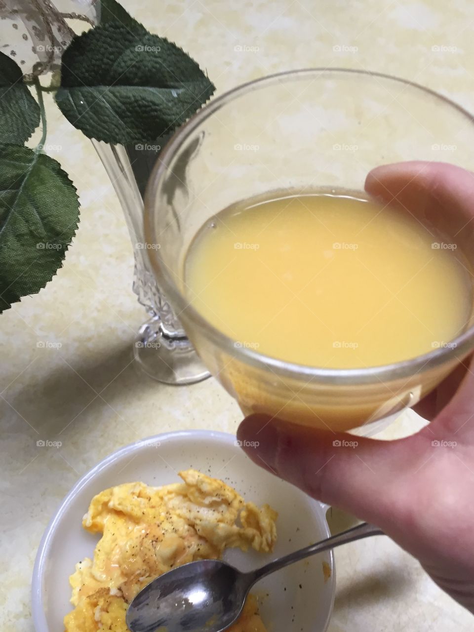 Morning ritual drinking orange juice