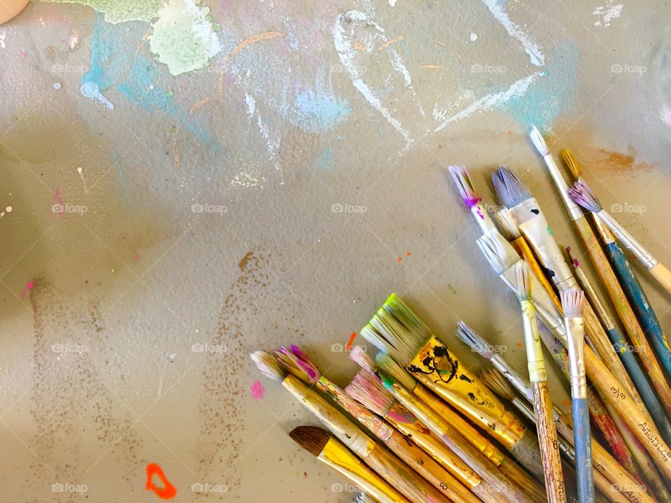 Group of old used paint brushes