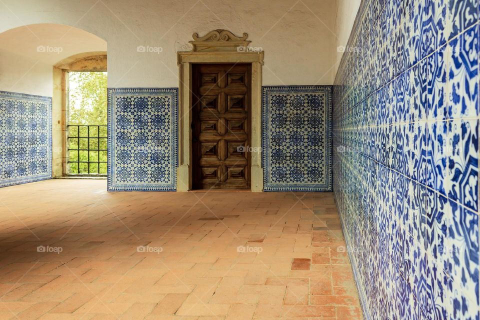 Azulejos adorn the wall at Templar Castle, Convento de Cristo in Tomar, Portugal 