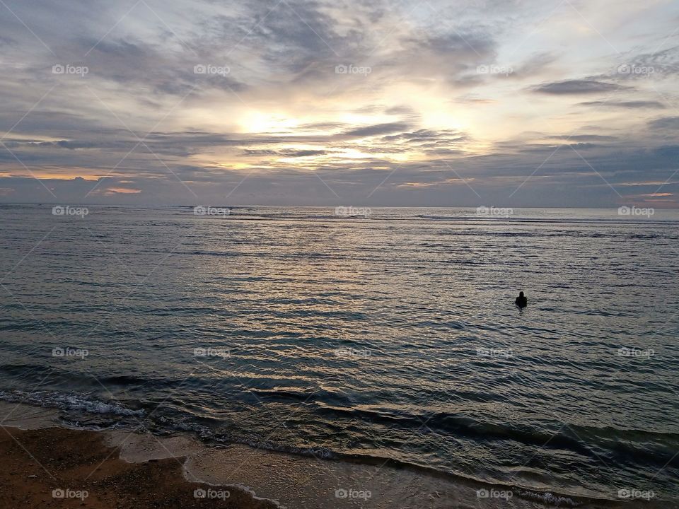 waiting for sunset in beautiful beach