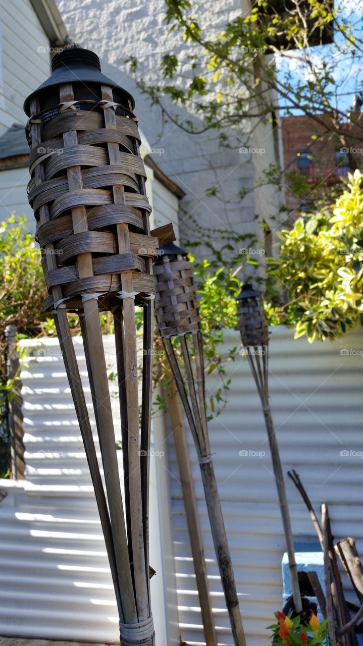 old bamboo tiki torches