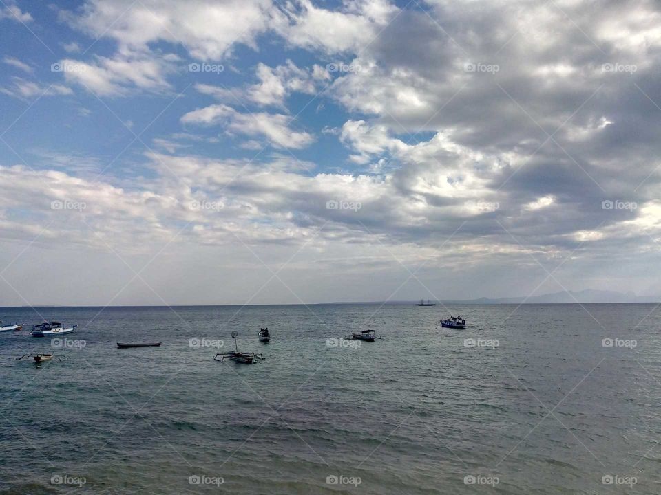 Visit Lasiana Beach at Kupang - East Nusa Tenggara. You will meet a lovely beach and so many fishermen with their small boats. A beautiful sunset can be used for instaspot. Come Visit Indonesia