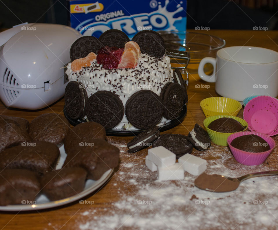 Making oreo cupcakes 