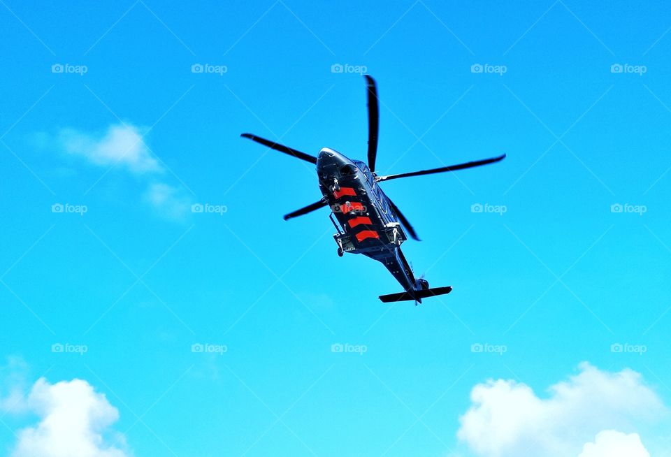 helicopter on blue sky in offshore.