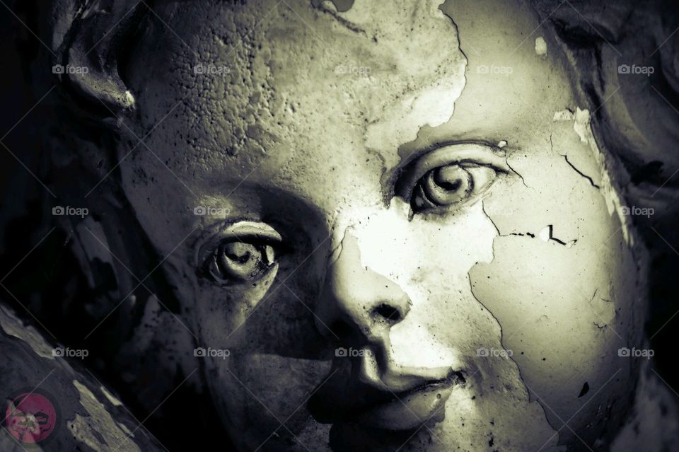 Weathered Cherub Statue . Weathered Cherub Statue 