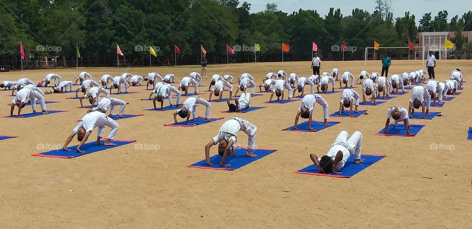 yoga at a school.  keep fit mind and soul
