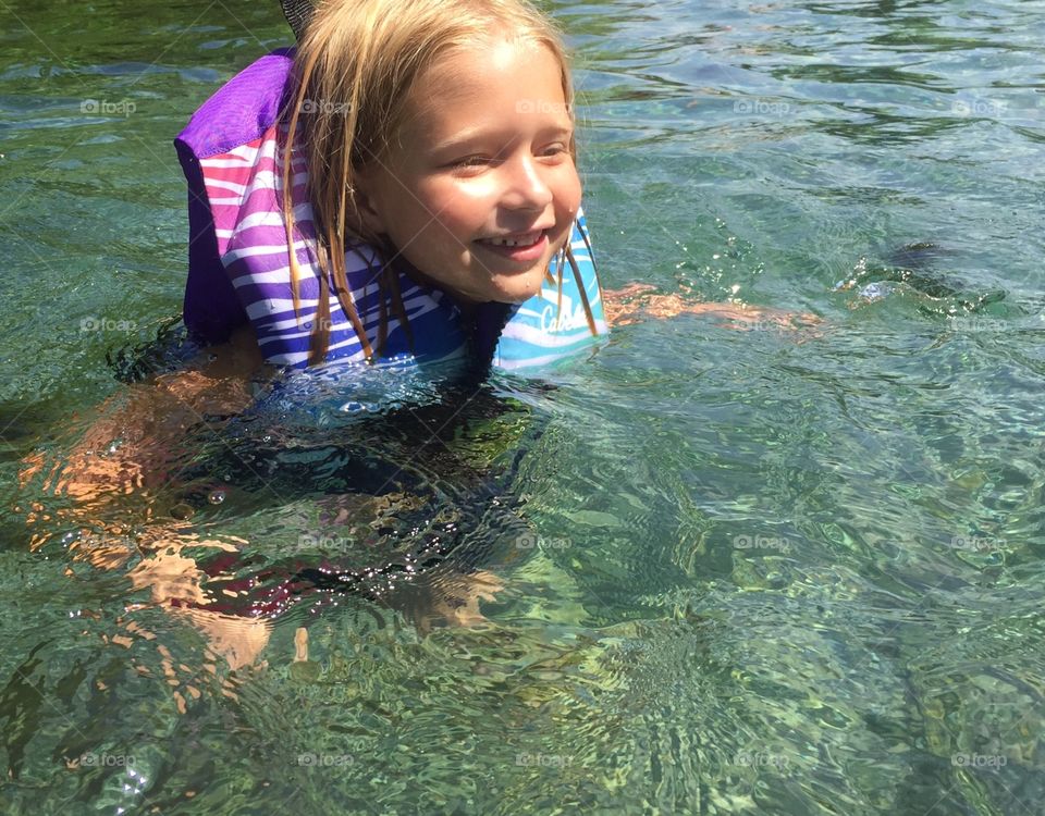 Learning to swim and a Texas spring, for the early summer swimming competition.