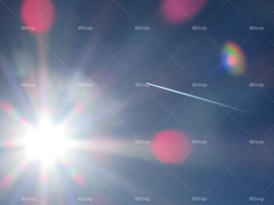 Plane and sun