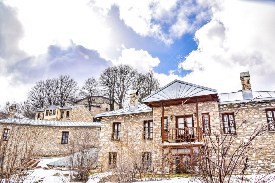 Traditional Snowy Hostel In Winter
