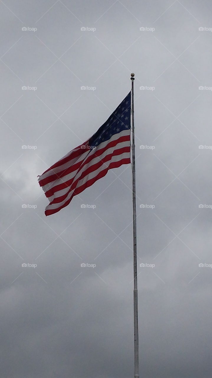 American flag billowing in the wind