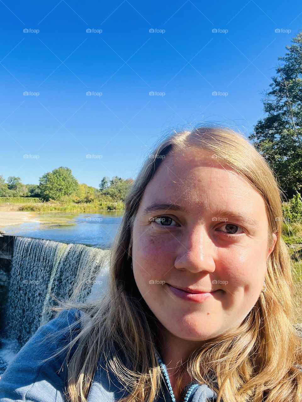 Selfie in front of a waterfall in an Estonian National park.