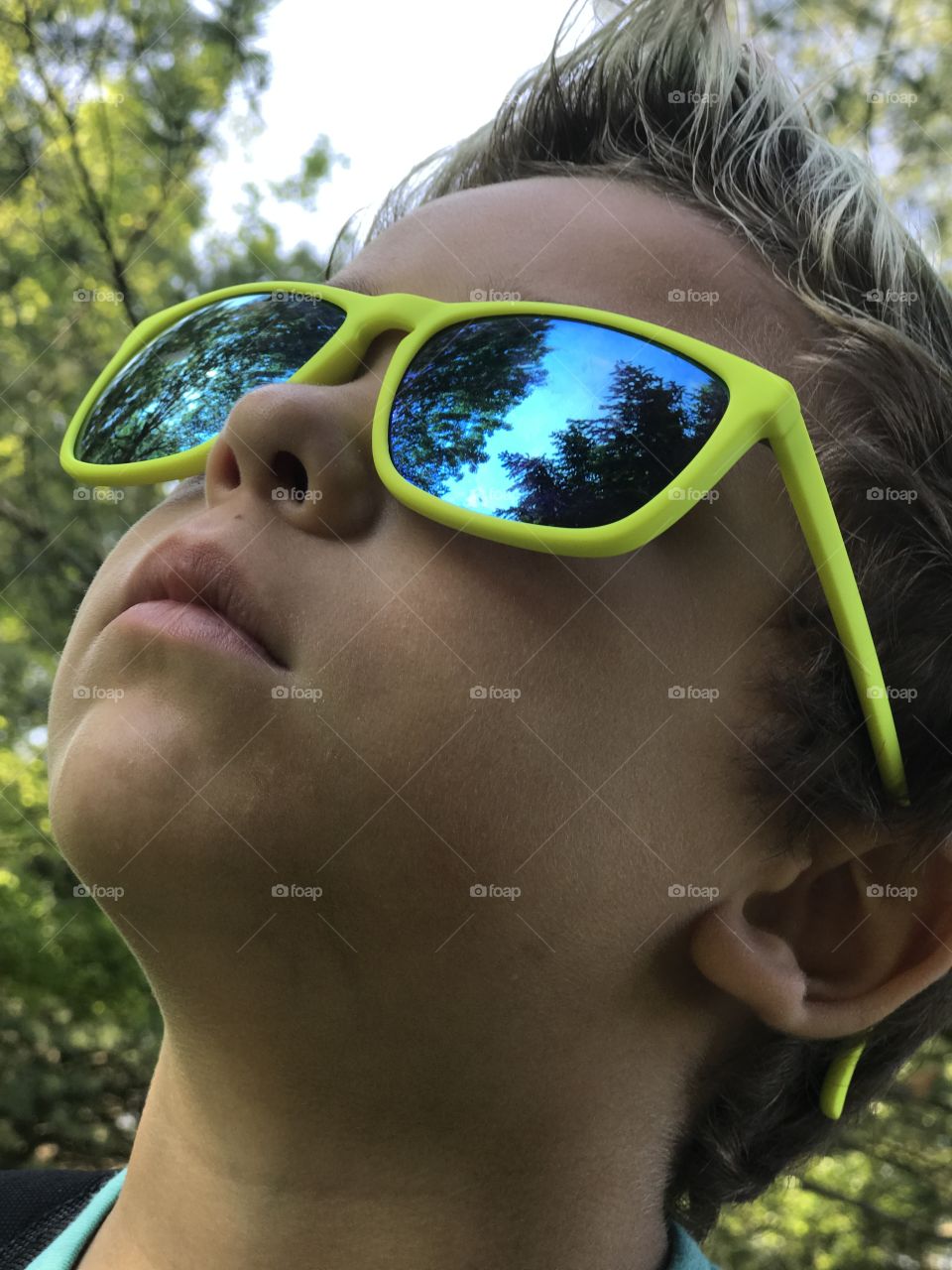 Close-up of a boy wearing goggles