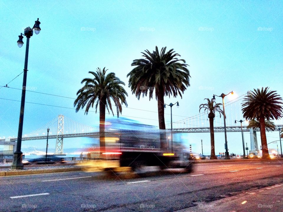 San Francisco streets with Bay Bridge in back 