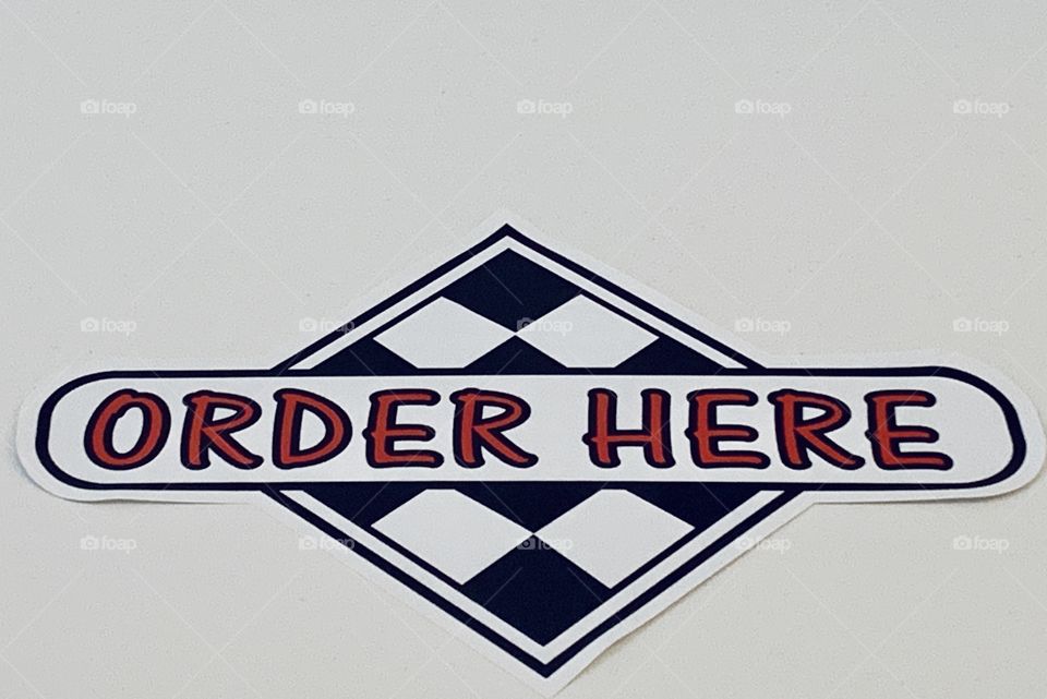 Sign on the wall in a delicatessen