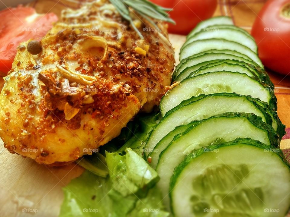 baked chicken fillet and cucumbers, homemade food!