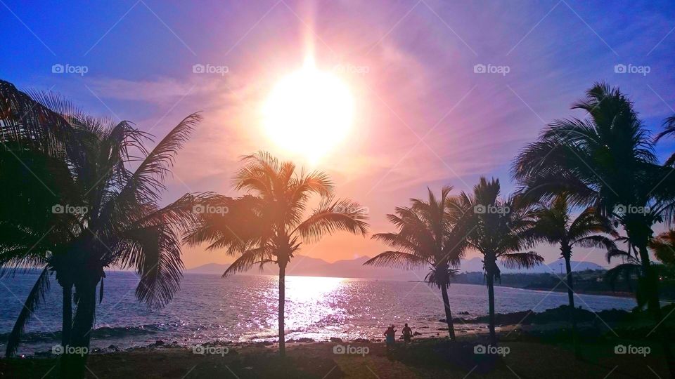 Scenic view of sunset at sea