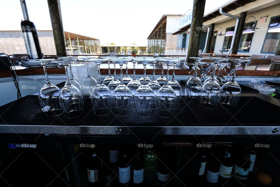 Bar table and wine glass inside the restaurant with no people