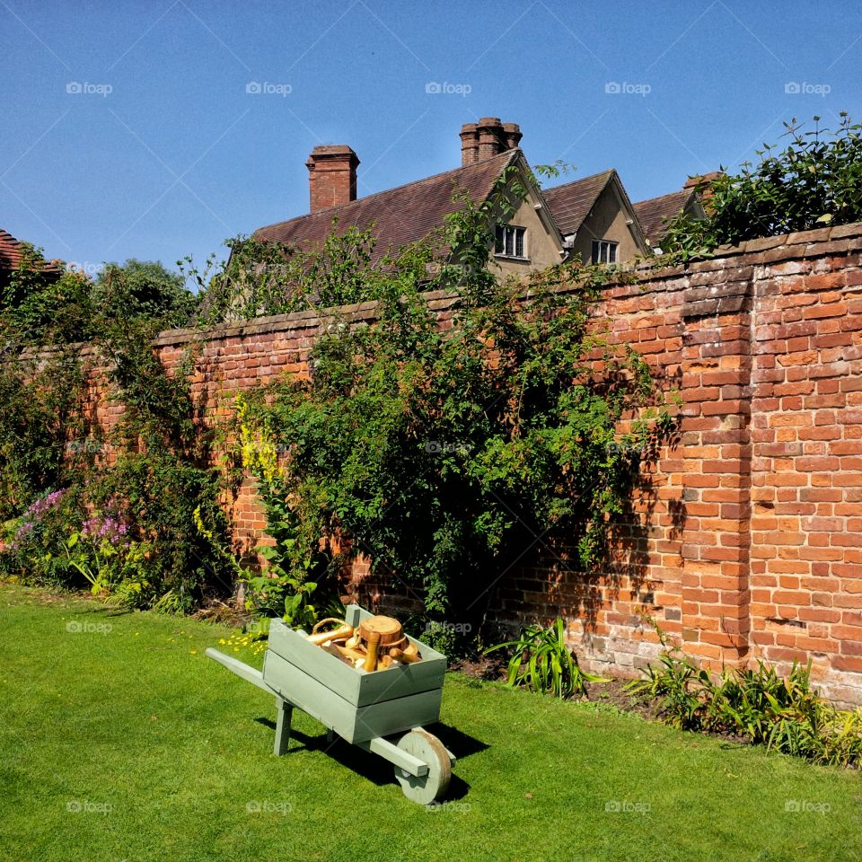 	Formal gardens of Packwood House stately home - Warwickshire, England UK.