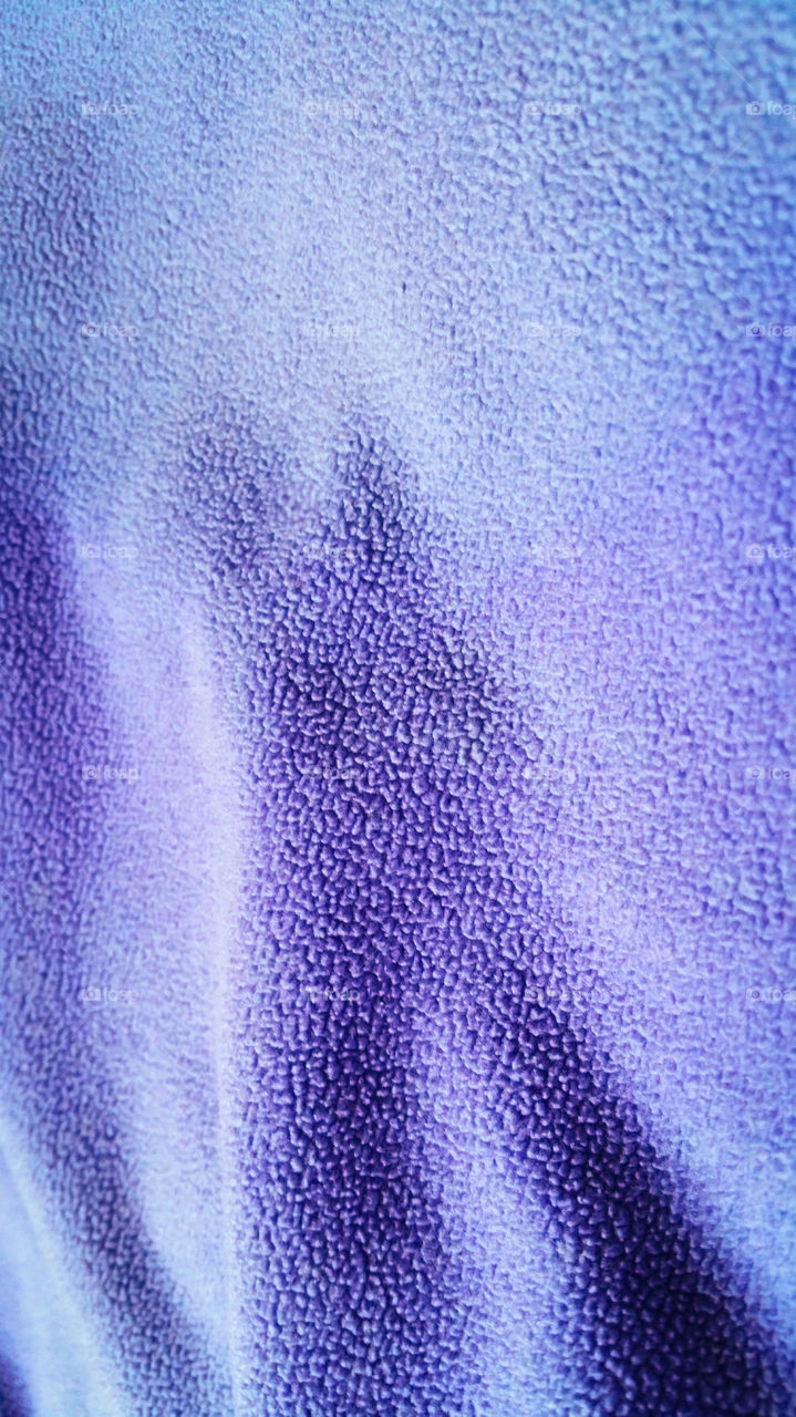 A purple fabricsape / fleece