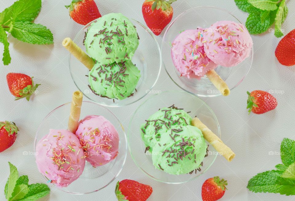 Colourful strawberry and mint ice cream bowls.