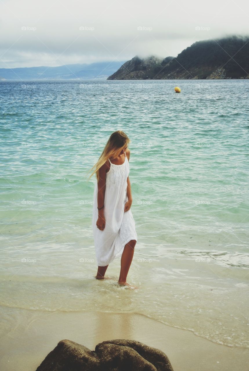 a girl in a lagoon