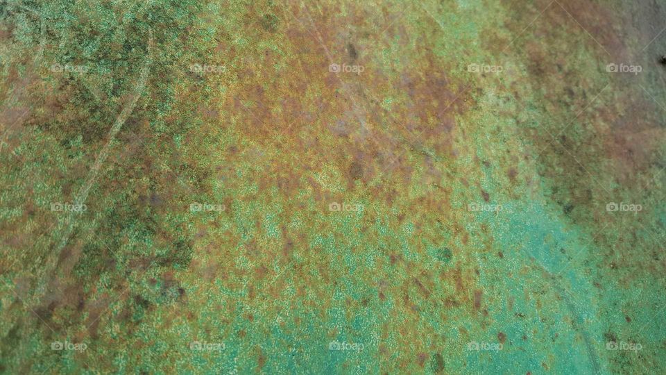 The rusted patina of old metal is both beautiful in color and texture.