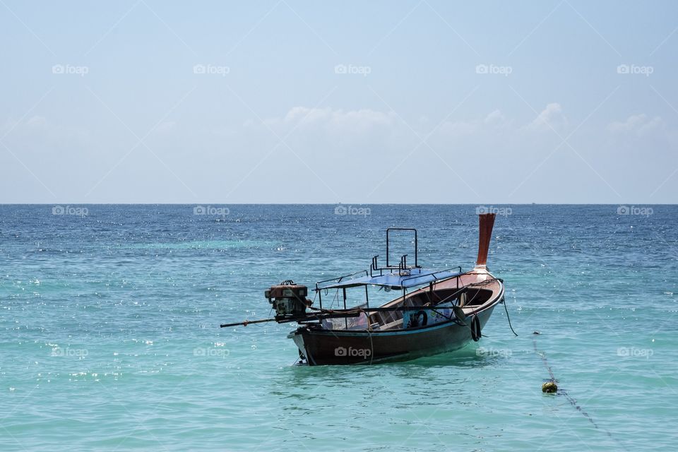 Small boat in the sea