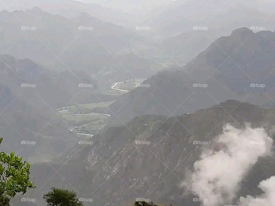 Glory be to God, the magnificent and picturesque view and the natural green trees are a view that is nothing more wonderful than it