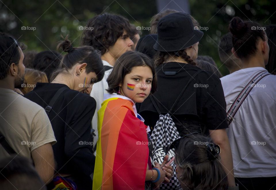 Young girl in the crowd, Pride street festival