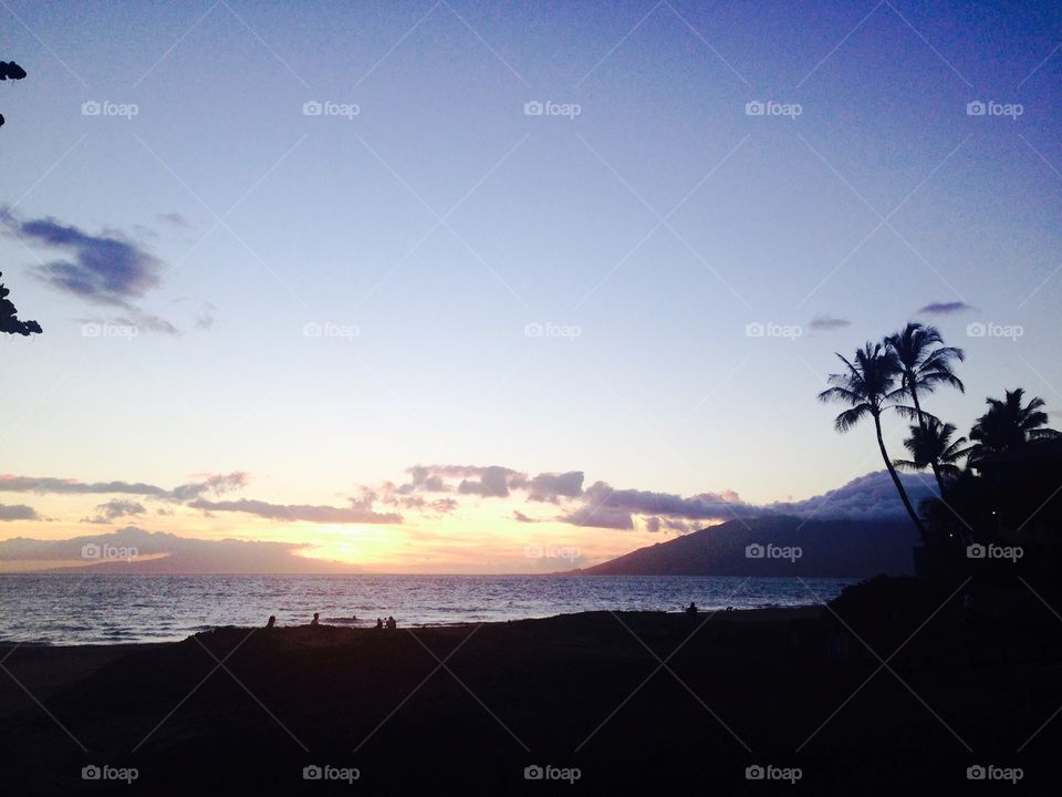 Tropical sunset in Maui . Perfect view at the golden hour at the beach in Maui 