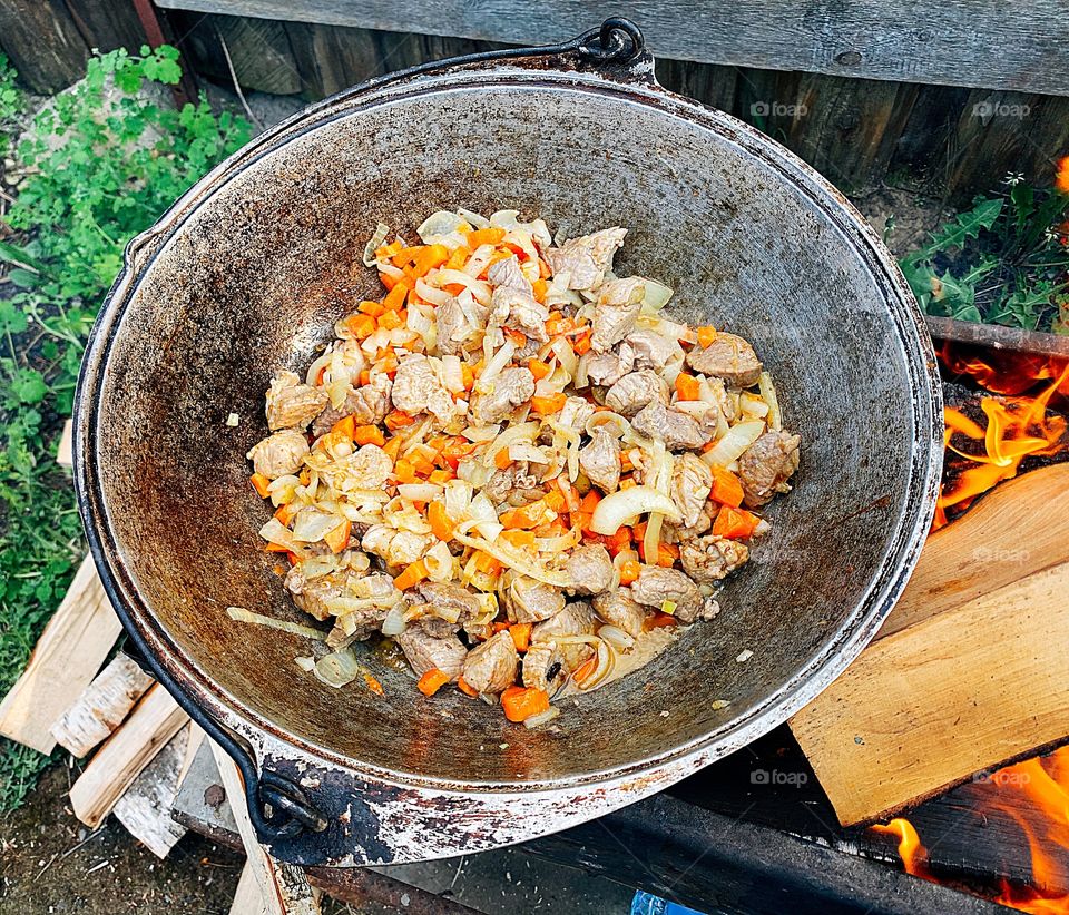 Cooking food on the campfire