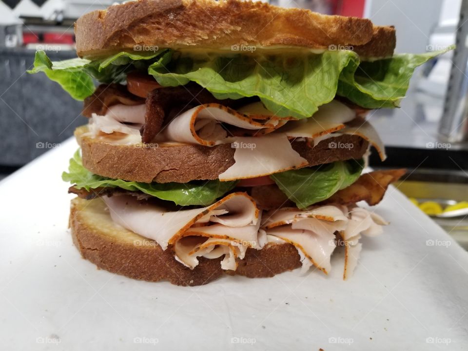 turkey club on Italian with Hellman's Real Mayonnaise. This sandwich is a work of art.