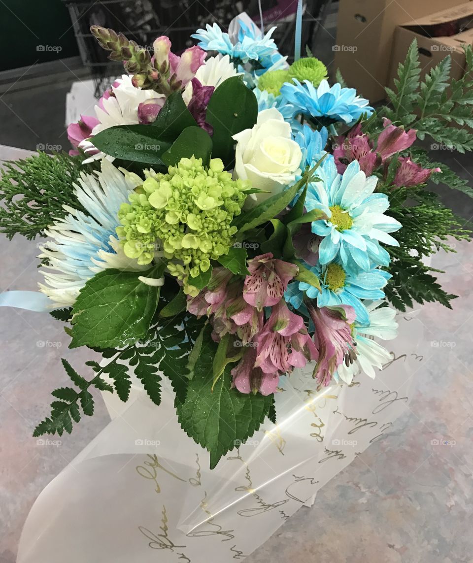 Mixed bouquet of Flowers for a new mom of a handsome baby boy. White, blue and a small touch of pinkish 