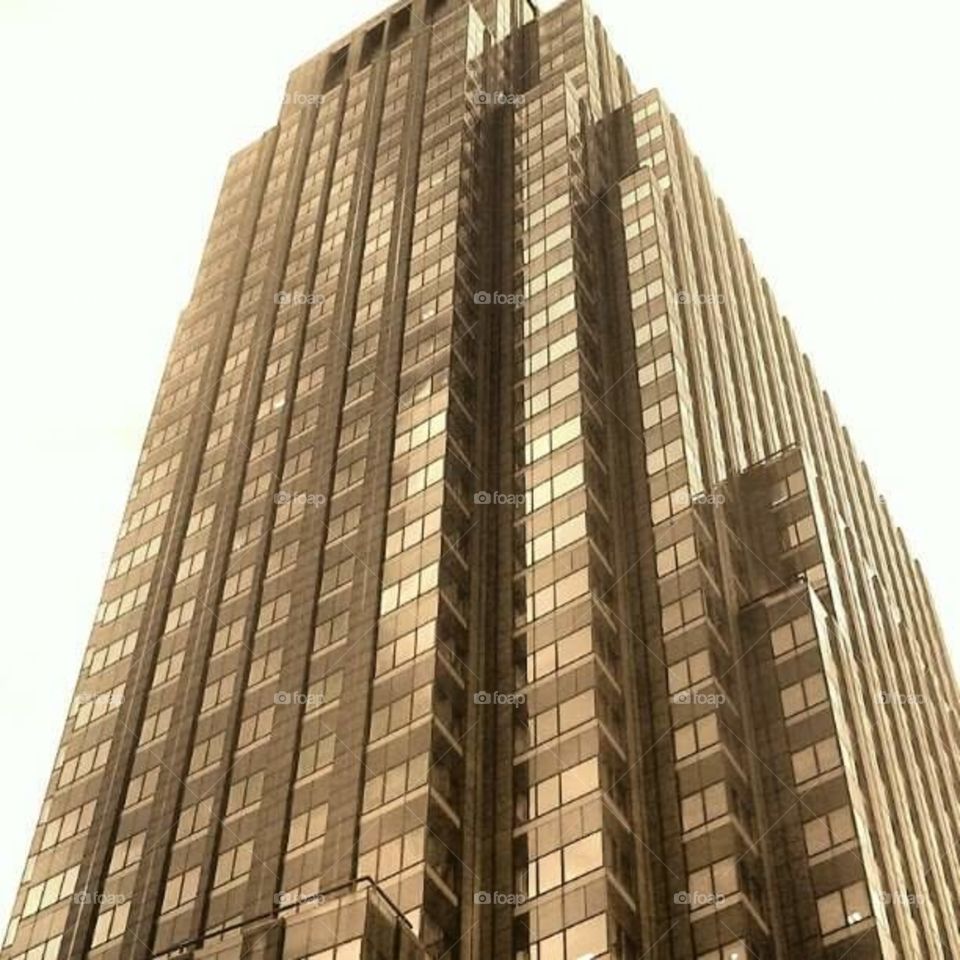 One of the,many skyscrapers on 53rd street, downtown in Manhattan (NYC). I added some touches to it using Picsart app.