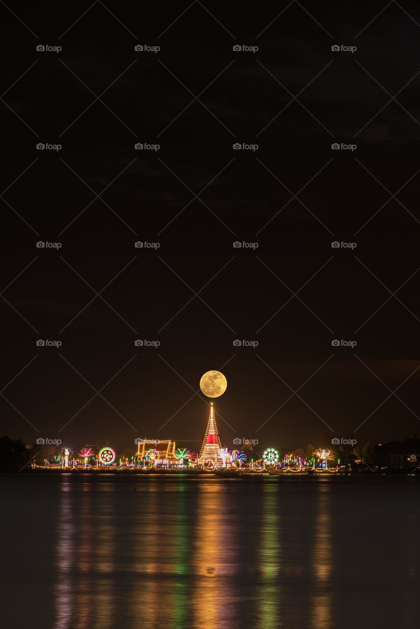 Full moon above Phra Samut Chedi Samut Prakan Province and reflect on the Chao Phraya River
