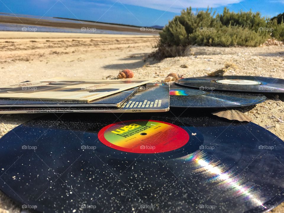 Beach scene vintage vinyl records sand