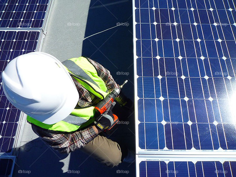 Solar panel install with technician