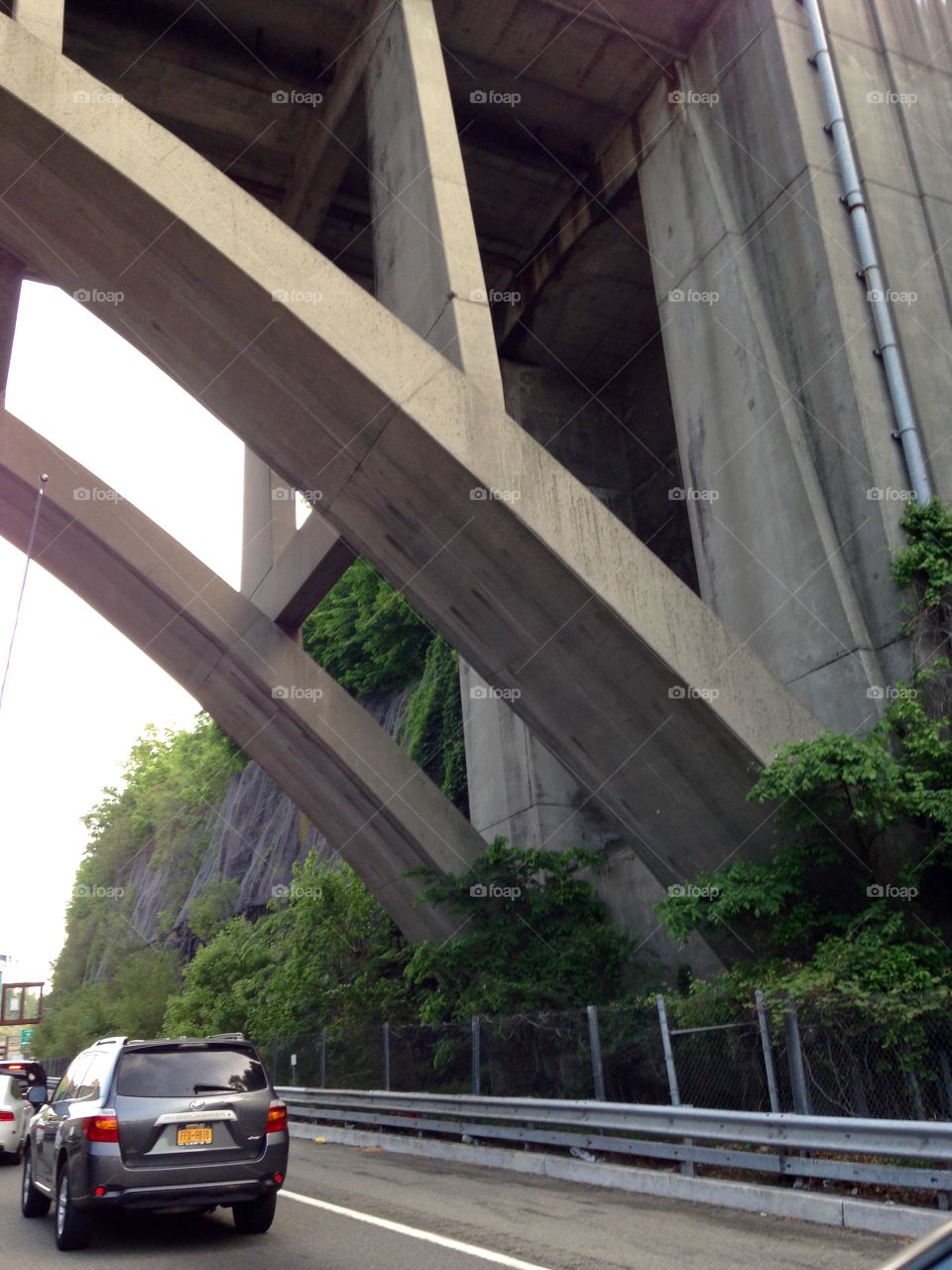 Massive Road  Bridge Supports. Traveling a highway going under bridges I couldn't believe the size of supports for bridges. Amazing and cool pic!