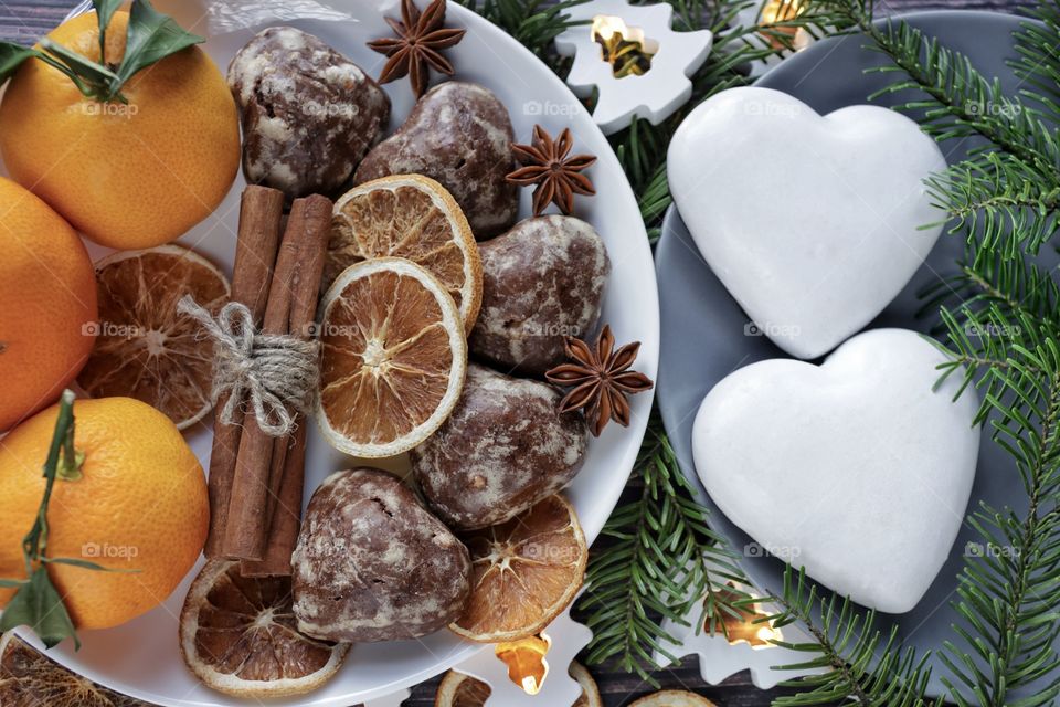 Christmas still life with dried orange, gingerbreads  and mandarins