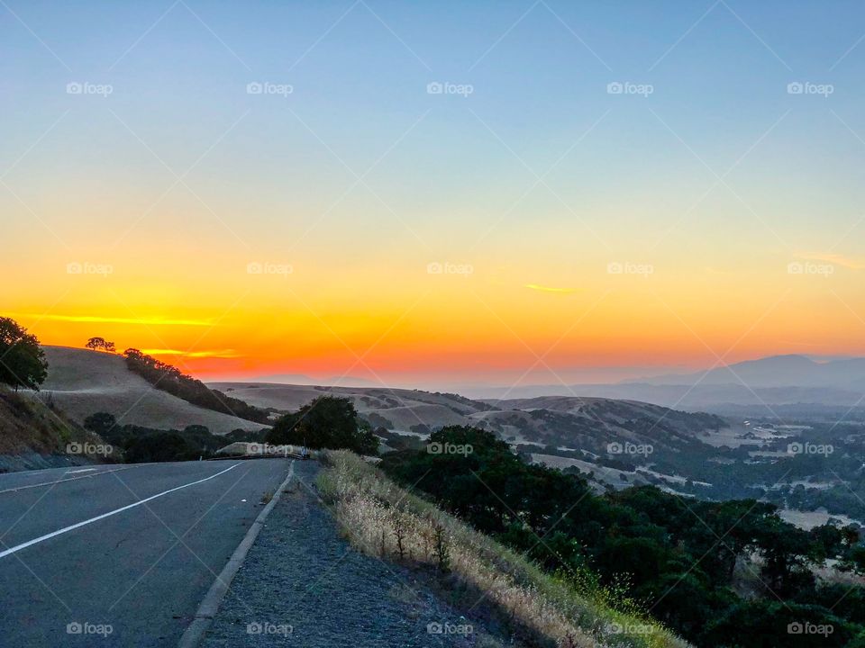 Road leading to a beautiful sunset