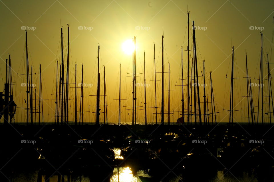 sailing boats. sailing boats moored in tel aviv pier at sunset