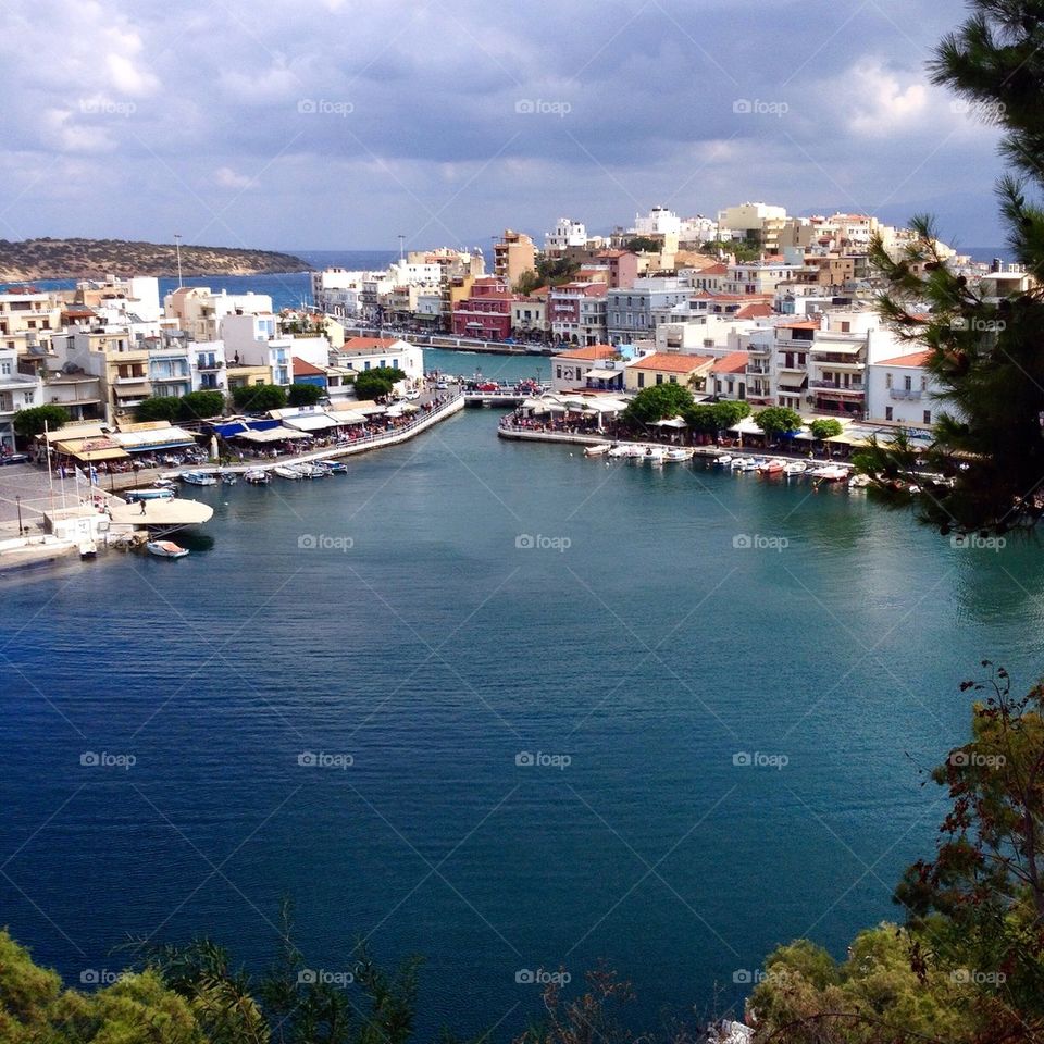 Scenic view of a small town with idyllic sea