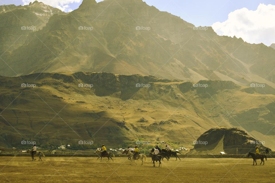locals of kargil playing horse polo game in summer