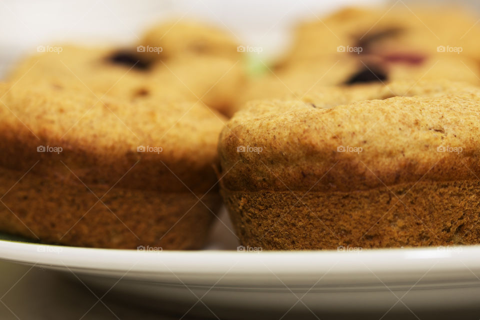 Homemade oat and banana muffins on a plate